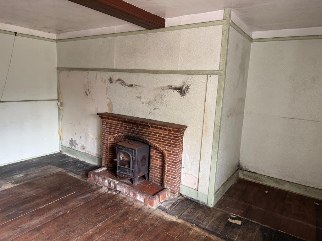 Lot: 53 - TRADITIONAL FARMHOUSE FOR IMPROVEMENT WITH BARNS AND OUTBUILDINGS ON A 2.5 ACRE PLOT - One of the Main Reception Rooms